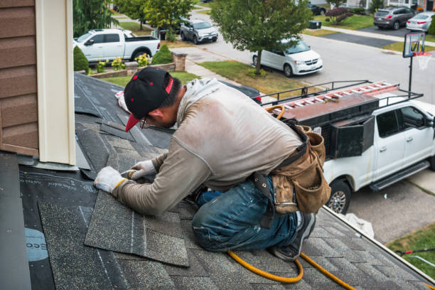 Professional Flat Roof Repair technician working in Woodmere, LA
